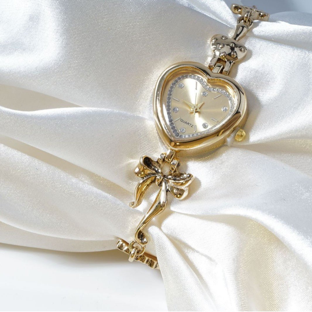Retro Heart - shaped Bracelet Watch With A Golden Bow And Flower Design A Stylish Womens Timepiece - Oopsdadforgot.com