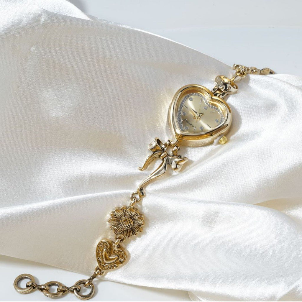 Retro Heart - shaped Bracelet Watch With A Golden Bow And Flower Design A Stylish Womens Timepiece - Oopsdadforgot.com